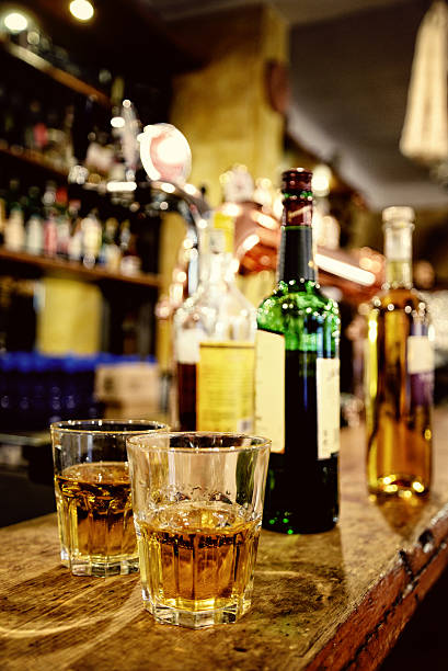 istock glass with wisky in old pub 517989284