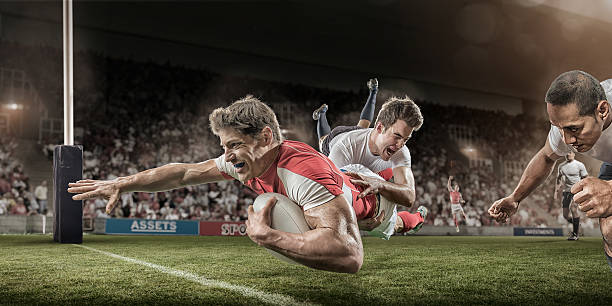 istock Rugby Player Dives to Score Whilst Being Tackled 517990070