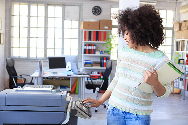 istock Young woman at the office 517990376