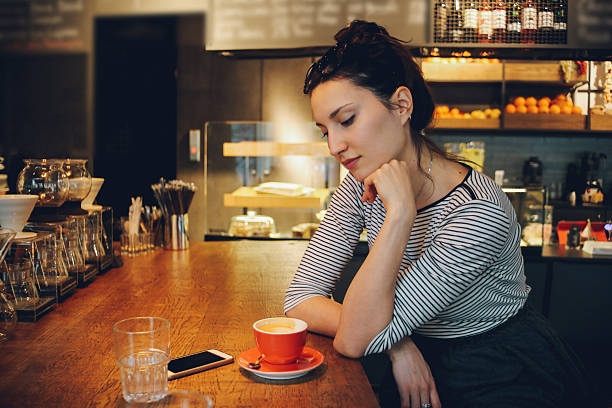 istock Young woman enjoying a coffee break 517990604