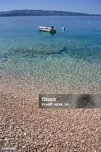 Little Boat On Pebble Beach Stock Photo - Download Image Now - Adriatic Sea, Backgrounds, Bathtub