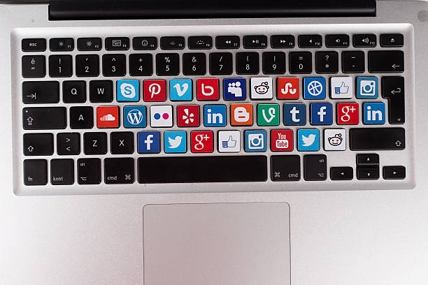 ソーシャルメディアキーボードのロゴのマックブック - reddit ストックフォトと画像