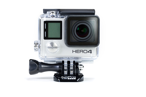 Adelaide, Australia - October 13, 2014: GoPro Hero 4 Black, isolated on white background. The GoPro Hero 4 Black is a compact, lightweight personal camera manufactured by GoPro Inc. The camera is often used in extreme action video photography. 