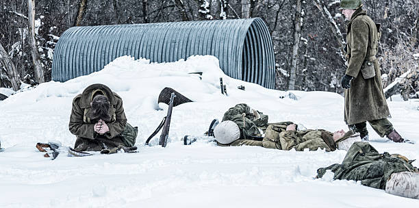 istock WWII Soldier Praying For Dead Ambushed War Casualties 517993420