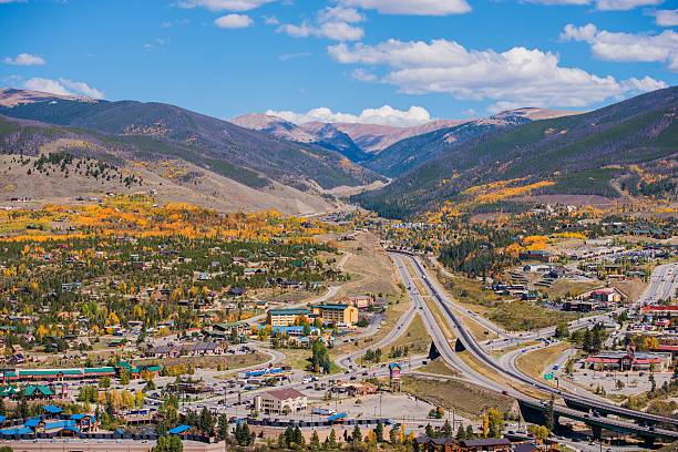 Silverthorne and Dillon Colorado Silverthorne and Dillon Cities in Colorado. Cities Panorama with I-70 Interstate Highway in the Middle. Early Fall Time. summit county stock pictures, royalty-free photos & images