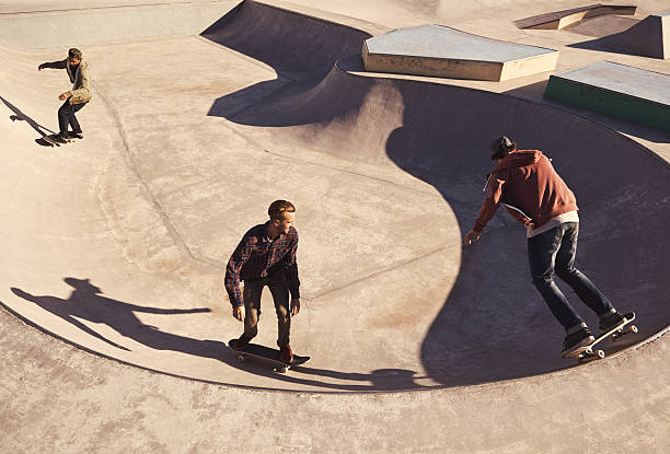 This is their second home Young men skating at a skate park x games stock pictures, royalty-free photos & images