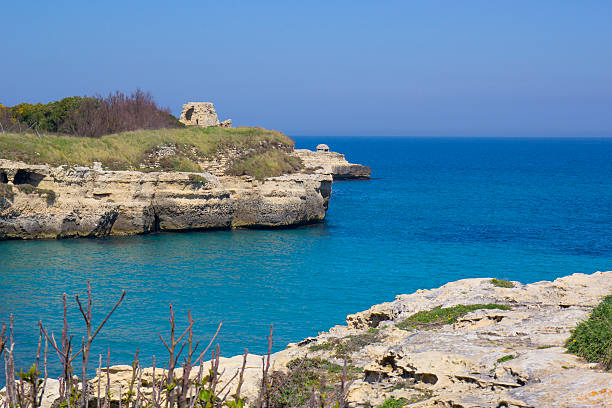 istock Scenic rocky cliffs on the waterfront of Salento 517993996