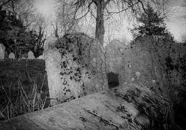 istock Haunting image of gravestones in a cemetery 517994210