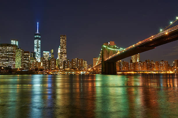 istock Brooklyn Bridge with lower Manhattan skyline at night 517995755