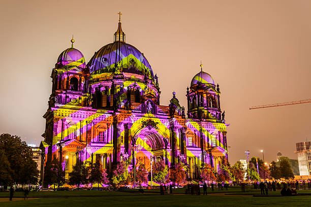 Berlin, Germany - October 11, 2014: Festival of lights 2014 and Berlin Cathedral in Berlin. FESTIVAL OF LIGHTS is one of the large illumination festivals in the world since 2005. Many visitors marvel at the illuminated Berlin Cathedral.