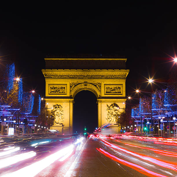 istock Champs Elysees Avenue with Christmas lighting at night 517996095