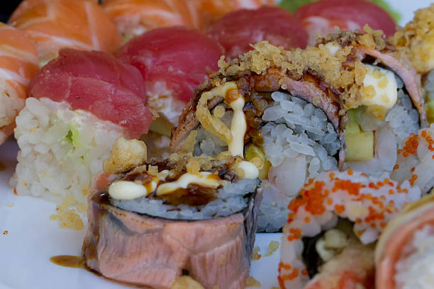 istock Sushi rolls with vassabi on the plate 517996299