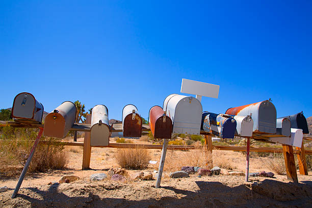 istock Grunge mail boxes in a row at California Mohave desert 517996779