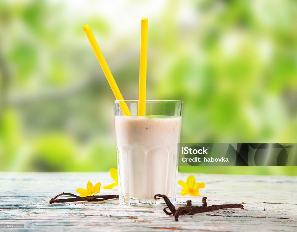 Fresh milk Fresh milk, vanilla drink on wooden table, assorted protein cocktail with nature background. Healthy lifestyle. Vanilla Stock Photo