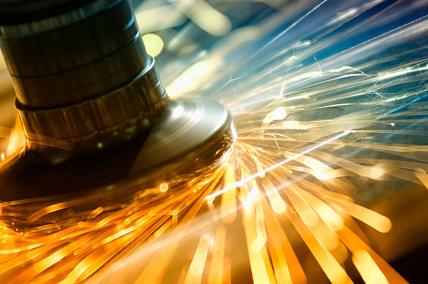 Metal grinding technology Electric wheel CNC grinding on steel structure produces colorful sparks laser cutting metal stock pictures, royalty-free photos & images
