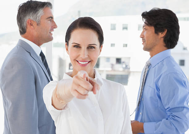 istock Businesswoman pointing to the camera 517997459