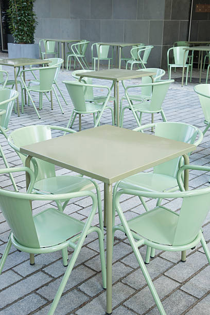 istock Green Cafe Tables and Chairs 517997516