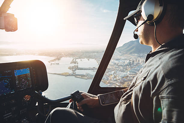 istock Pilot in cockpit of a helicopter 517997592