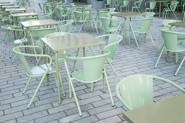 istock Green Cafe Tables and Chairs 517997598