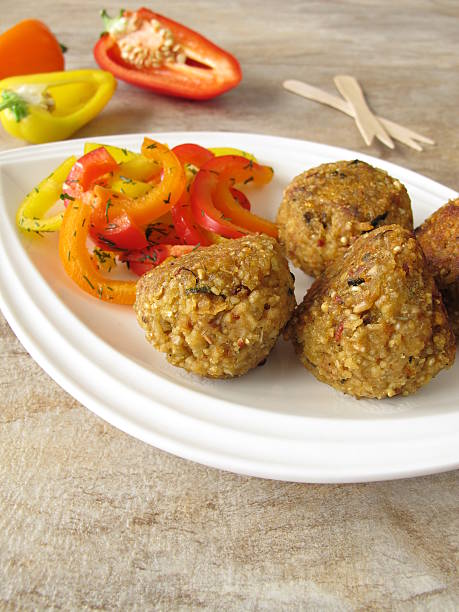 istock Falafel balls with bell pepper 517997747