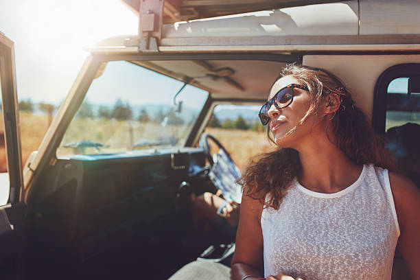 istock Woman taking a break from the road trip 517998426