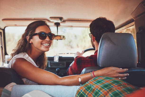 istock Couple in a car going on roadtrip 517998598