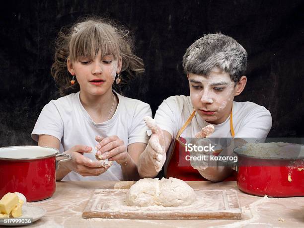 Teens Knead The Dough Stock Photo - Download Image Now - Adolescence, Baking, Bonding