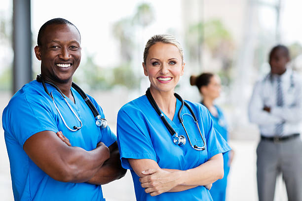 istock medical co-workers with arms crossed 517999114