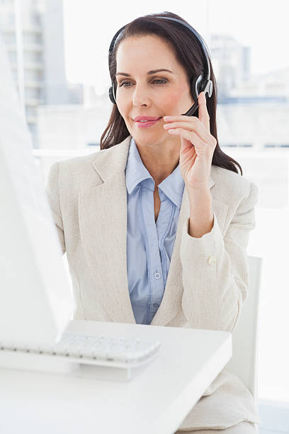 istock Businesswoman wearing a headset 517999145