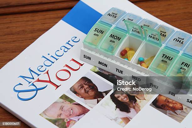 Medicare Booklet And Pills Stock Photo - Download Image Now - Medicare, Benefits, Brochure