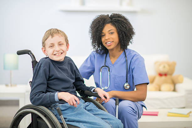 istock Nurse with a Child with a Disability 518000606