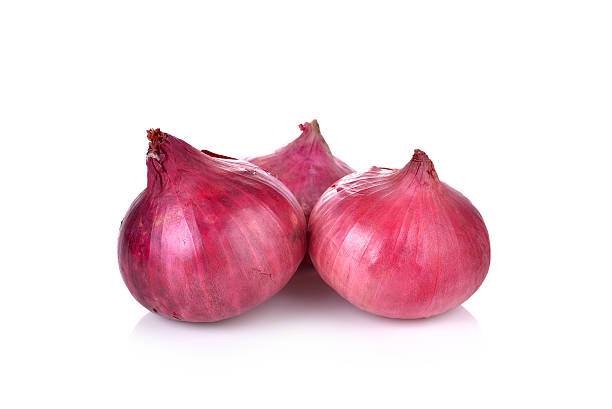 istock Red onion isolated on white background 518003260