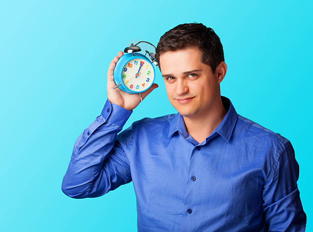 istock Casual man in shirt on blue background. 518011997