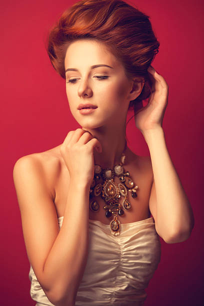 istock edwardian women with necklace 518012685