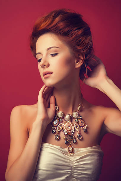 istock edwardian women with necklace 518012691