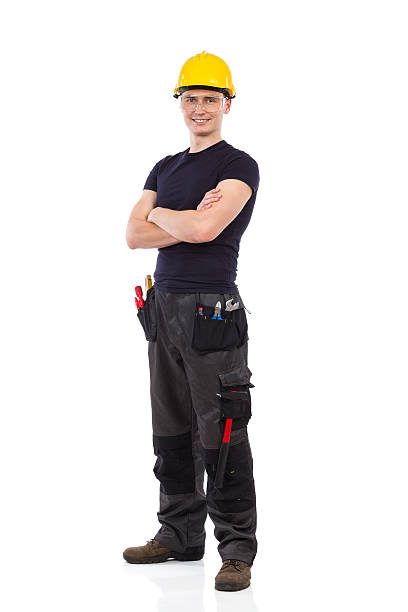 istock Mechanic in protective glasses and yellow hardhat 518014055