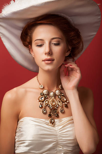 istock edwardian women with necklace 518014371