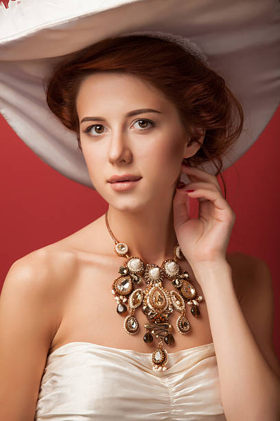 istock edwardian women with necklace 518014373