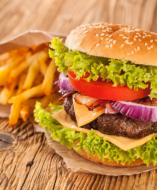 istock Fresh hamburger on wooden planks 518015839