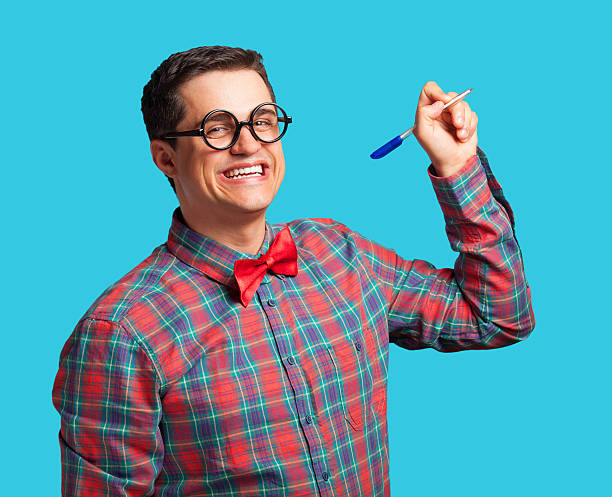 istock Nerd with pen and glasses on blue background. 518017223