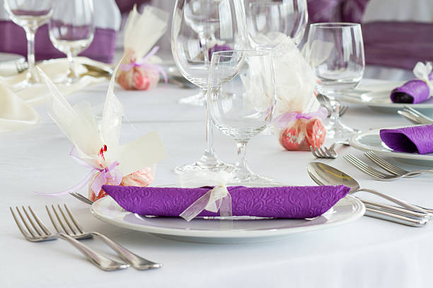 istock luxury place setting, purple napkin on plate 518018013