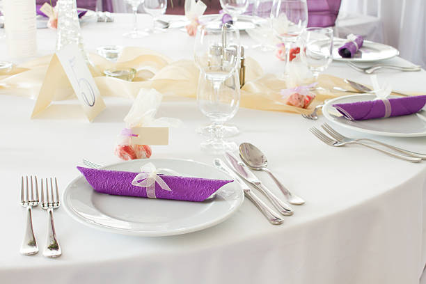 istock luxury place setting, purple napkin on plate 518018897