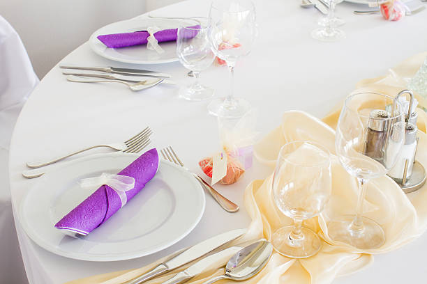 istock luxury place setting, purple napkin on plate 518019217