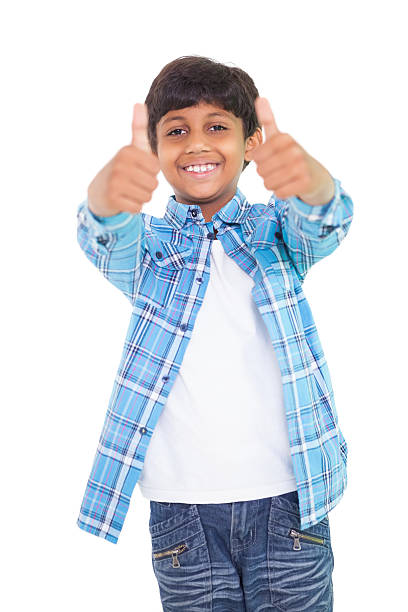 istock Cute boy showing thumbs up 518019581