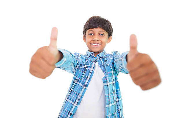 istock Cute boy showing thumbs up 518019587