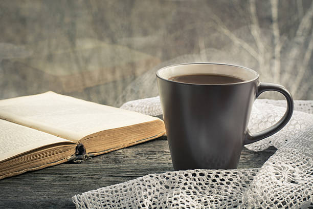 istock Cup of black coffee in front of the window. 518021006