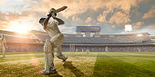 istock Cricket Batsman Hitting Ball During Cricket Match In Stadium 518022060