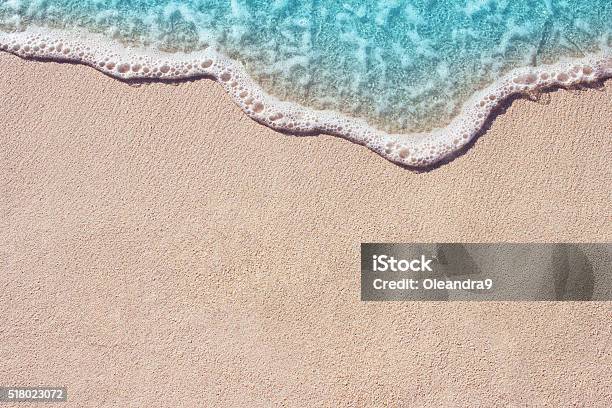 Soft Wave Of Ocean On The Sandy Beach Stock Photo - Download Image Now - Sand, Beach, Wave - Water