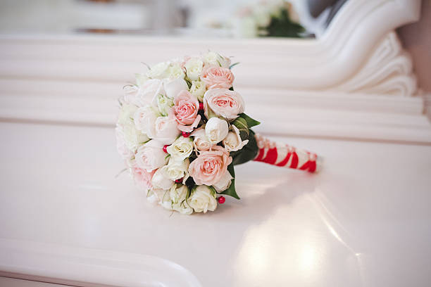 istock Wedding bouquet of roses on the table 518024984