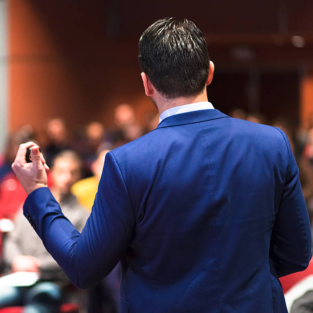 istock Public speaker giving talk at Business Event. 518031264